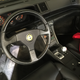 In pictures the 348 steering wheel looks plain and 80s-angular, but the real thing has subtle creases and other nice details including an embossed “348" logo. I am now a fan. Also, the thumb pads have horn buttons, making for a total of 3 horn buttons. The location of the third is an easy guess.
